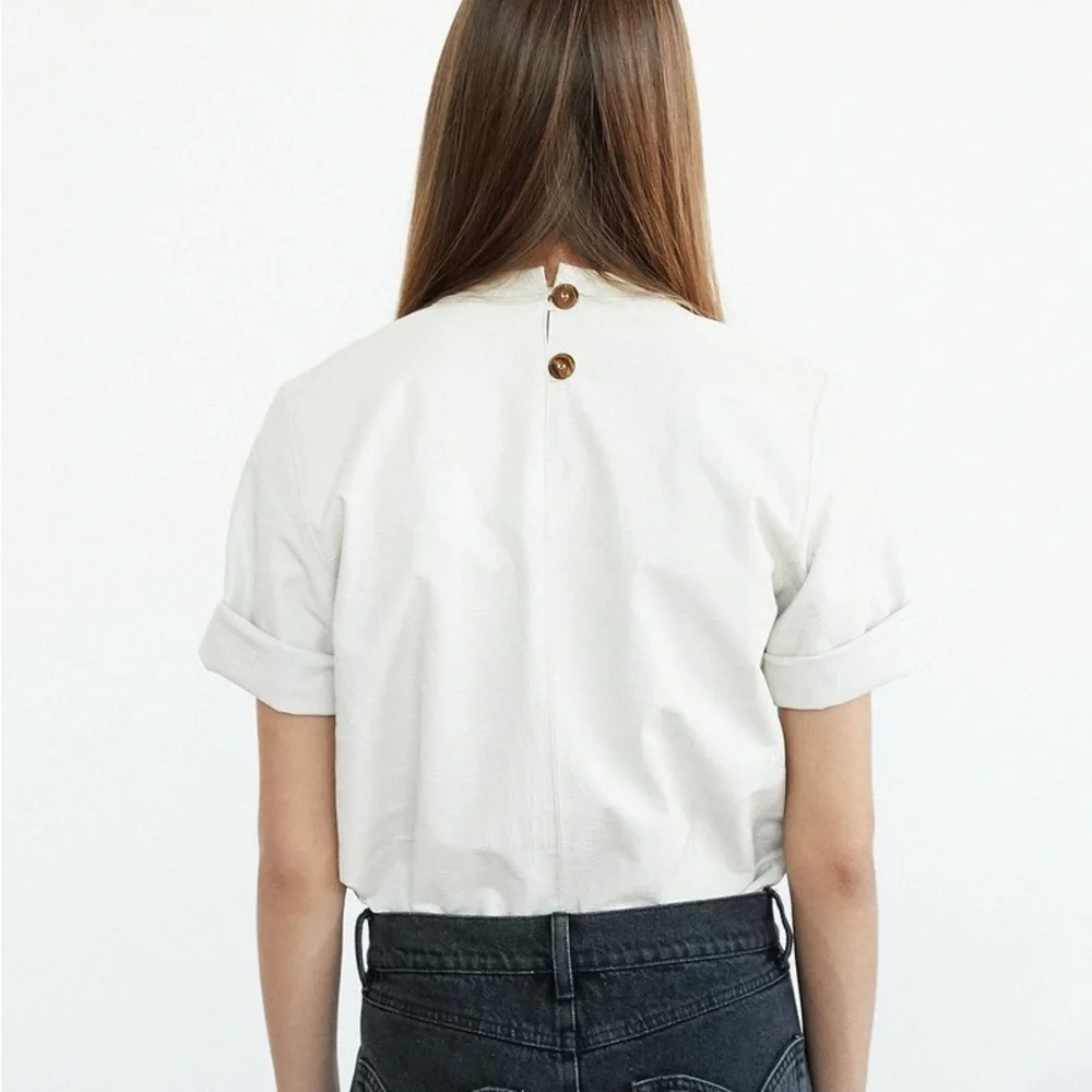 NANUSHKA Kaden Vegan Leather Tee Cream Short Sleeve Top